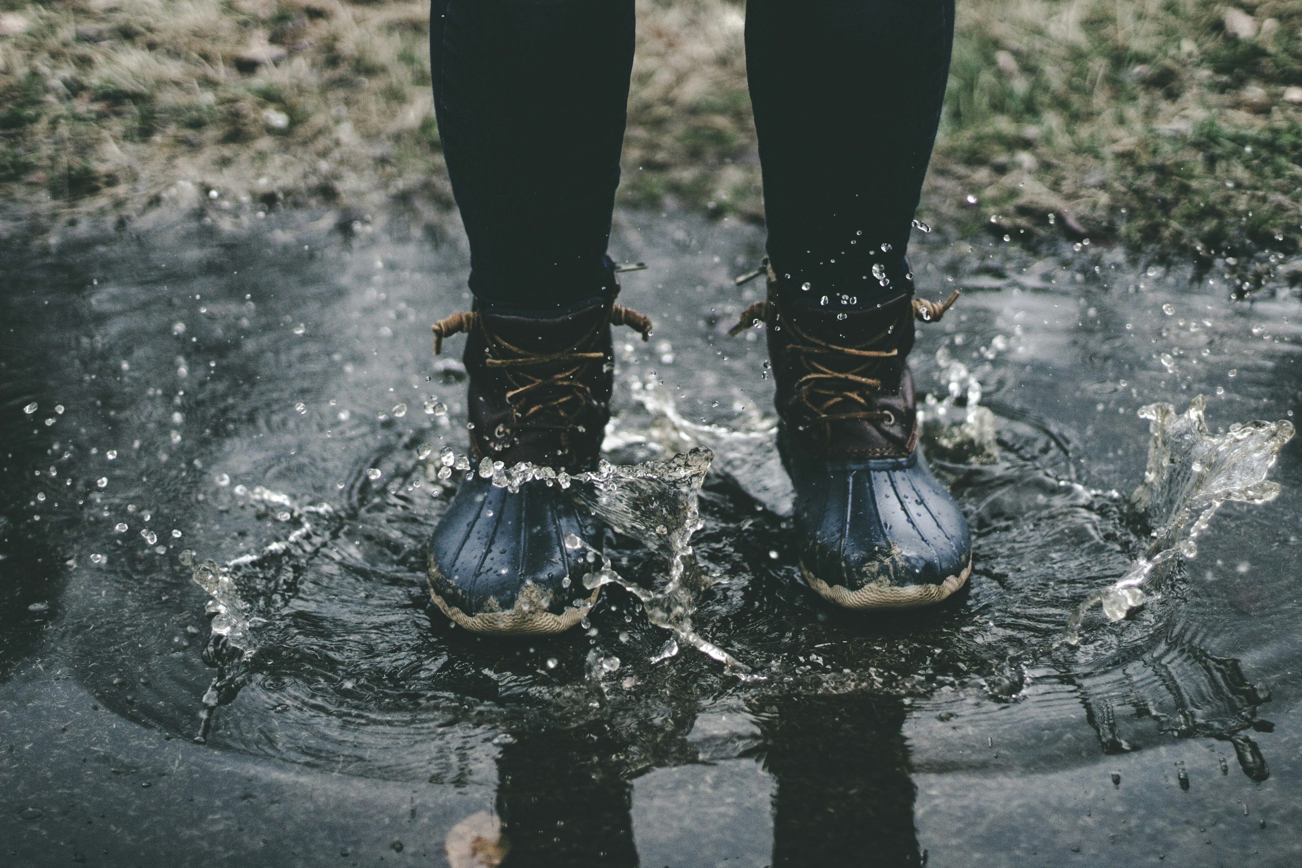 A hiker drenched by rain due to ineffective rain gear.