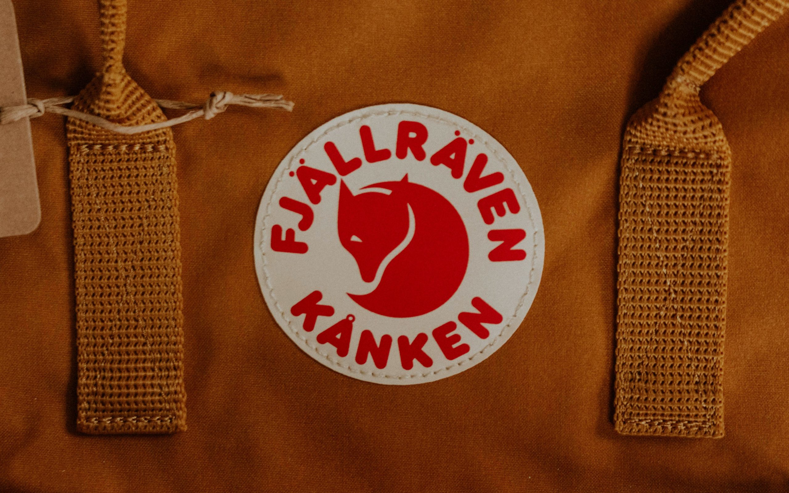 Example photo showing a full modular rainwear system including jacket, pants, gloves, and boots