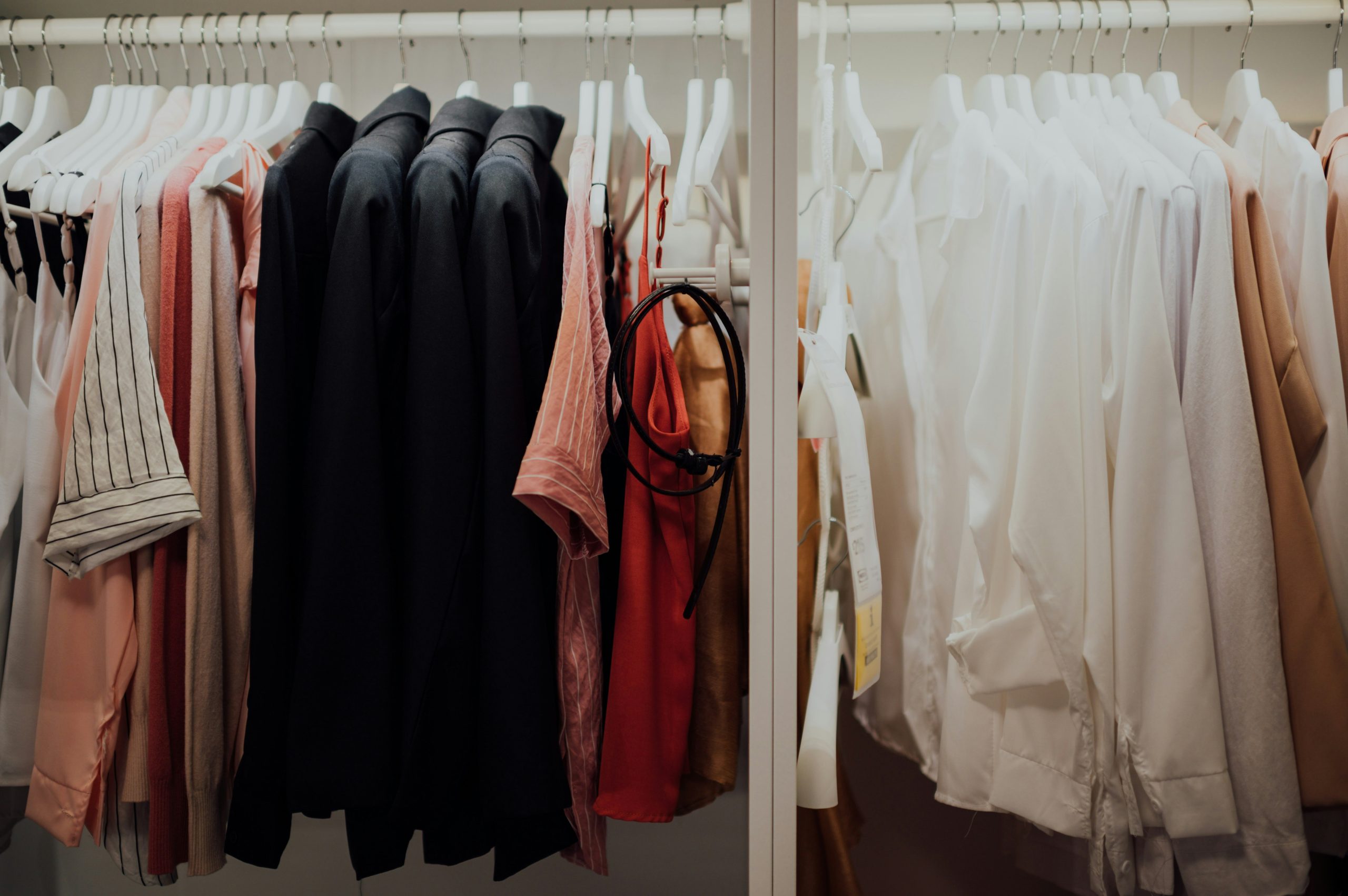Properly stored rain jackets hanging in a closet